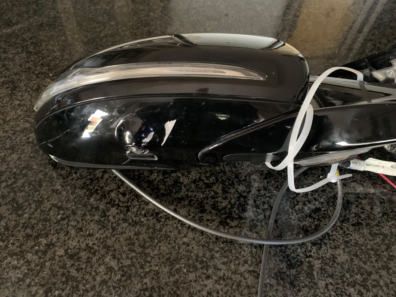 Side mirror with under-mirror camera